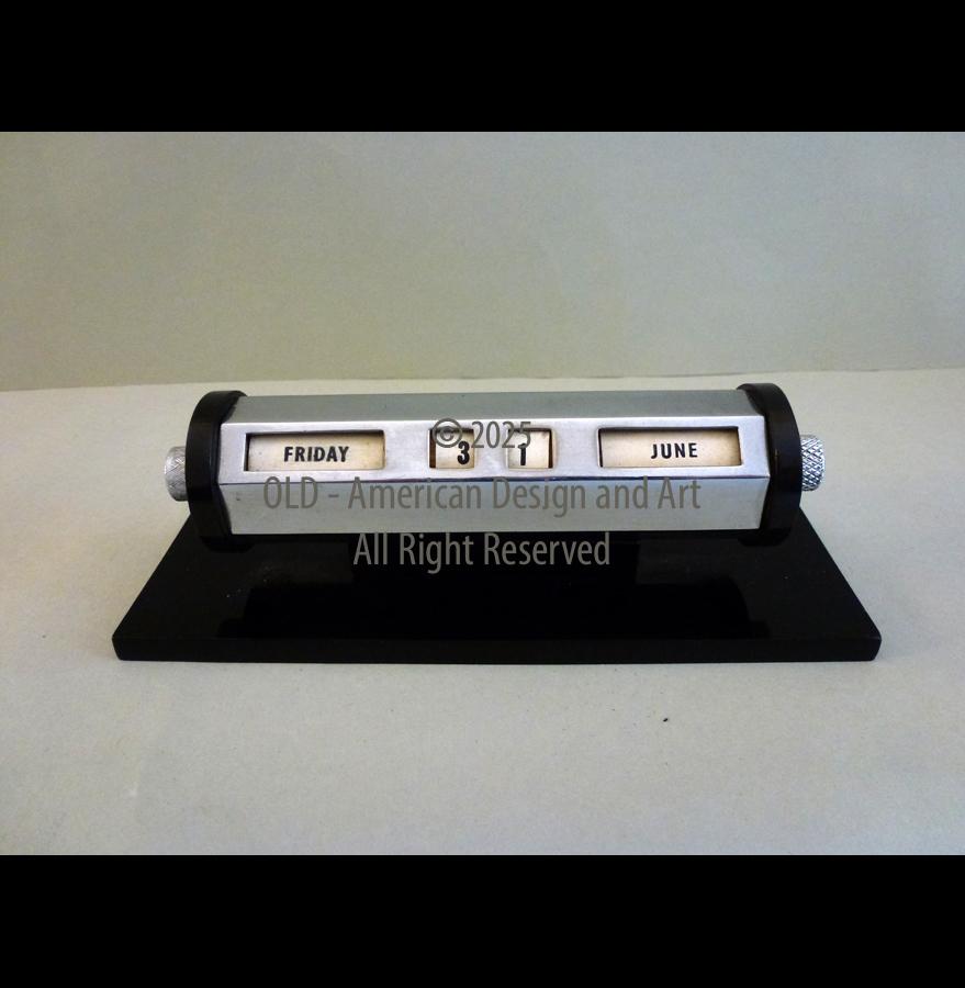 Calendario perpetuo in opalino nero e cromo , U.S.A. 1930
